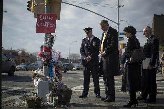 On January 14, 2014, Mayor Bill de Blasio, Police Commissioner Bill Bratton, incoming Transportation Commissioner Polly Trottenberg and Deputy Inspector Kevin Maloney of the 114th Precinct meet at Northern Boulevard and 61st Street, the dangerous Woodside intersection where 8-year-old Noshat Nahian was struck and killed in the crosswalk while walking to school in December